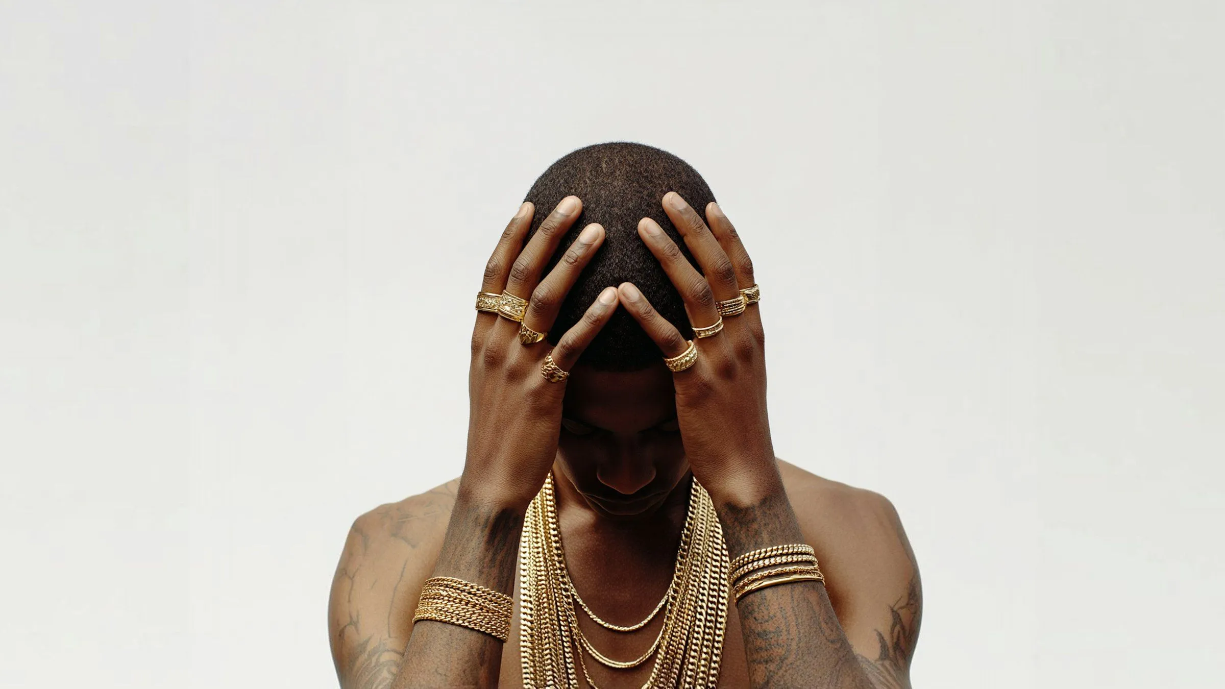 68484dda7fed2cd1d39a2ec8_Golden Adorned Person